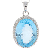 Oval blue topaz sterling silver pendant with accent, showcasing brilliance and elegance in a luxurious design.